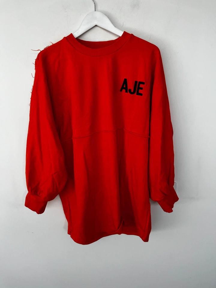 Aje orange jumper - size medium